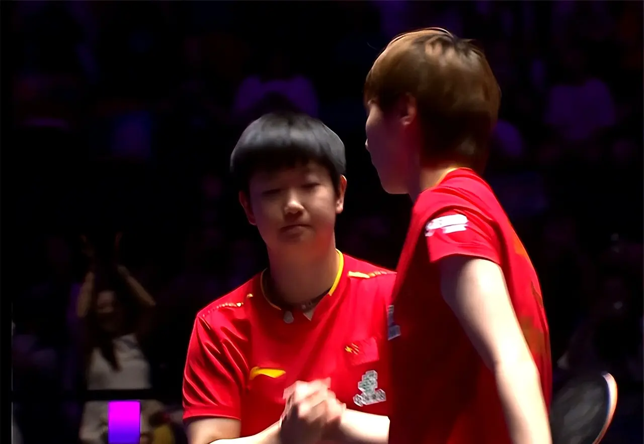 多运动员奋, 抓住了王曼